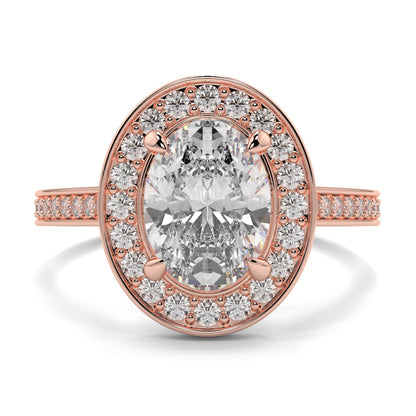 Rose gold ring with a large diamond and smaller diamonds around on a white background oval halo best sling design Yb Jewellers 