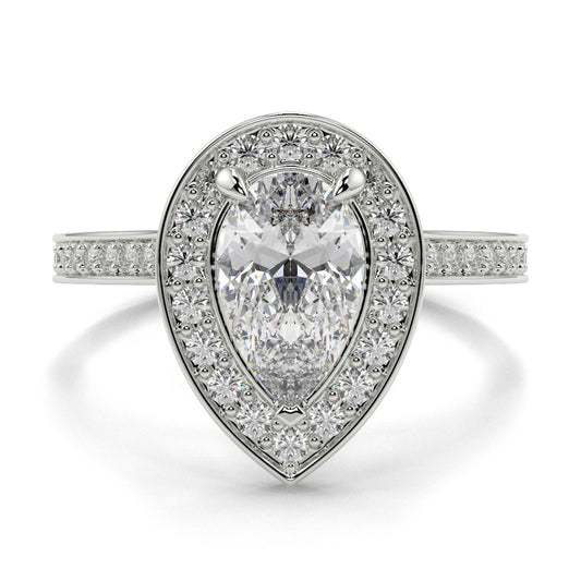 Diamond ring with pear-shaped center stone and halo on a white background Pear shaped diamond engagement ring Yb jewellers trending ring designs