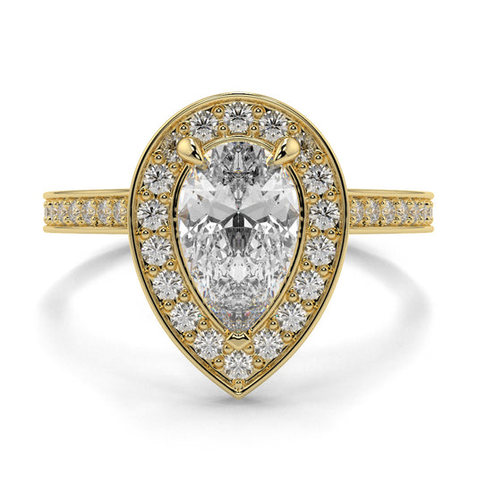 Gold ring with a pear-shaped diamond and smaller diamonds on a white background Pear shaped diamond engagement ring Yb jewellers trending ring designs
