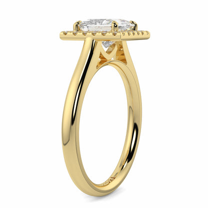 Gold ring with a diamond on a white background Yb jewellers princess cut diamond halo plain shoulders 