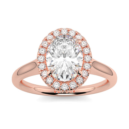 Rose gold ring with a large diamond and smaller diamonds around on a white background yb jewellers diamond halo with plain shoulder oval shape 