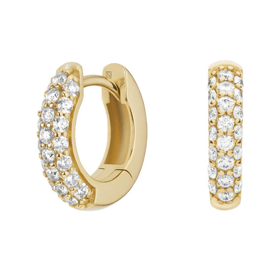 Gold hoop earrings with clear stones on a green background pair of huggiee earrings in 18k white gold platinum with micro diamond setting by yb jewellers 