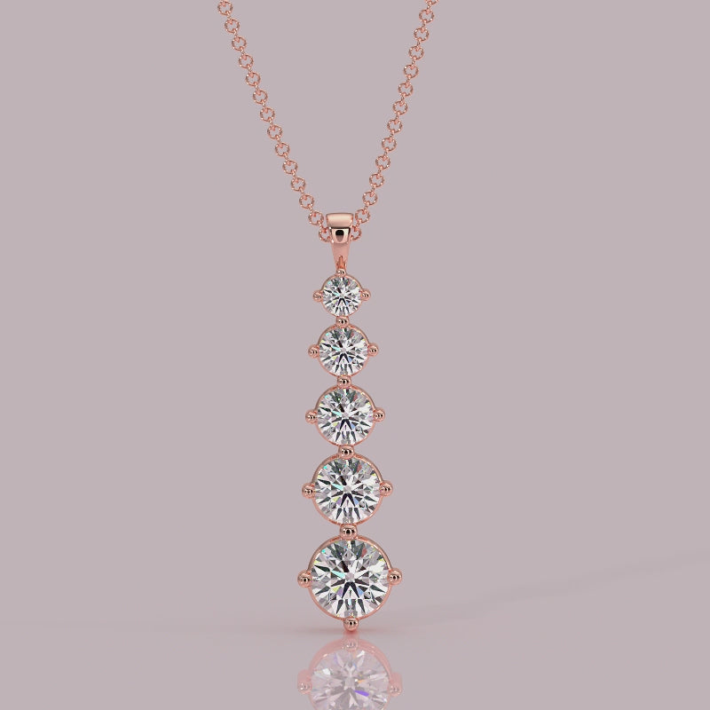 Model wearing Aurora five‑stone diamond necklace, graduated downwards, 18k rose gold
