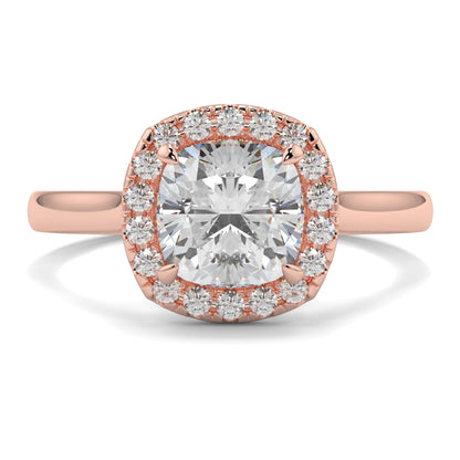 Rose gold ring with a large diamond and smaller diamonds around on a white background single halo with plain shoulder diamond engagement ring yb jewellers best seller trending ring 