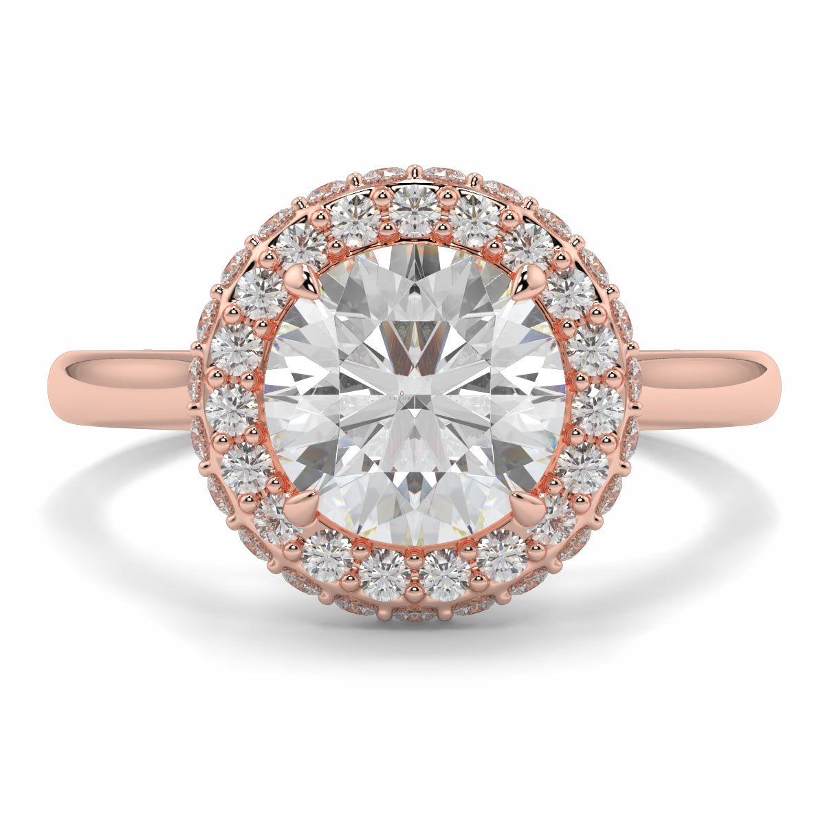 Rose gold ring with a large diamond and smaller diamonds around on a white background yb jewellers round diamond halo ring with plain shoulders trending bestseller design