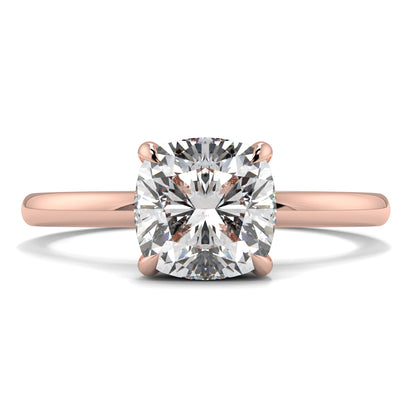 Rose gold ring with a large diamond on a white background yb jewellers solitaire engagement ring best selling design cushion shape diamond 4 claw with a slim band