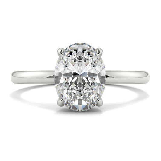 Diamond ring with two large diamonds on a white background yb_jewellers_solitaire_engagement_ring_best_selling_design_cushion_shape_diamond_4_claw_with_a_slim_band