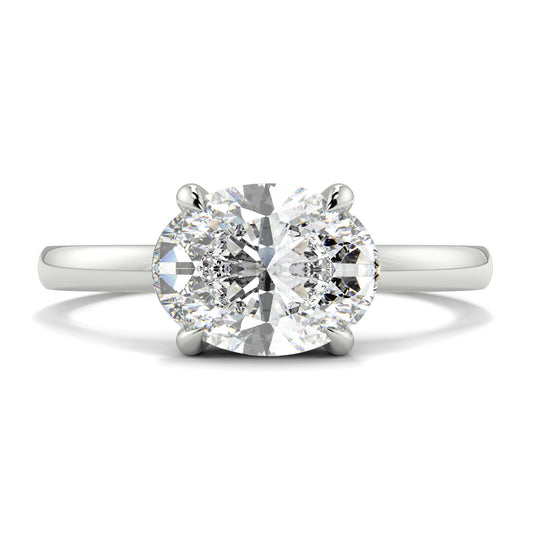 Diamond ring on a white background yb_jewellers_4_claw_emerald_diamond_engagement_ring_best_selling_design_with_a_thin_band