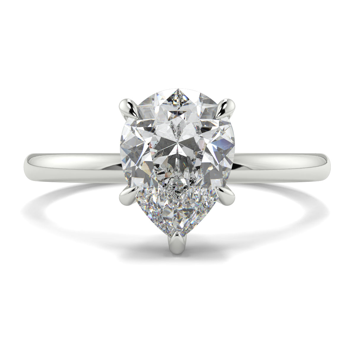 Pear-shaped diamond ring on a white background _yb_jewellers_solitaire_engagement_ring_best_selling_design_cushion_shape_diamond_4_claw_with_a_slim_band