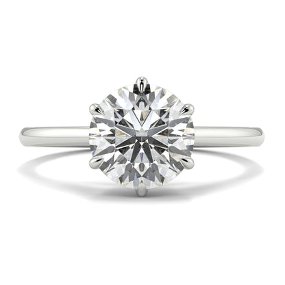 Diamond ring on a white background yb jewellers solitaire engagement ring with 6 claws set similar to tiffany style classic engagement ring round solitare diamond ring yb jewellers trending jeweller and ring designs