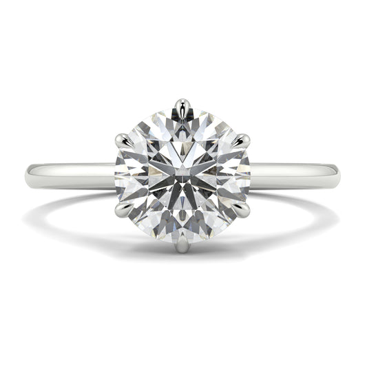 Diamond ring on a white background yb jewellers solitaire engagement ring with 6 claws set similar to tiffany style classic engagement ring round solitare diamond ring yb jewellers trending jeweller and ring designs