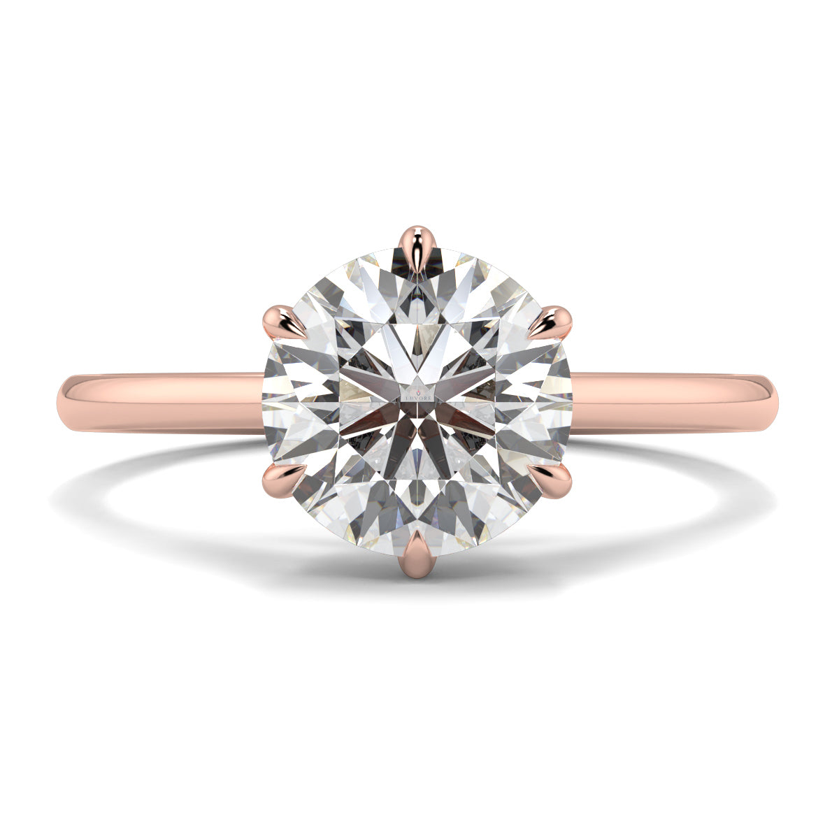 Rose gold ring with a large diamond on a white background yb jewellers solitaire engagement ring with 6 claws set similar to tiffany style classic engagement ring round solitaire diamond ring yb jewellers trending jeweller and ring designs