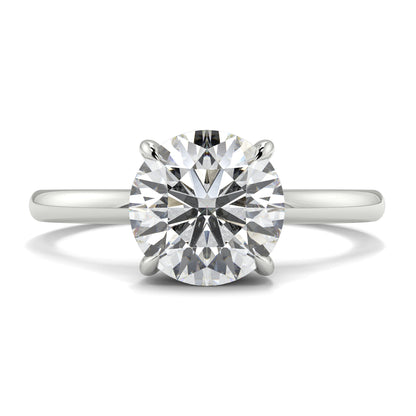 Diamond ring on a white background _yb_jewellers_solitaire_engagement_ring_best_selling_design_cushion_shape_diamond_4_claw_with_a_slim_band