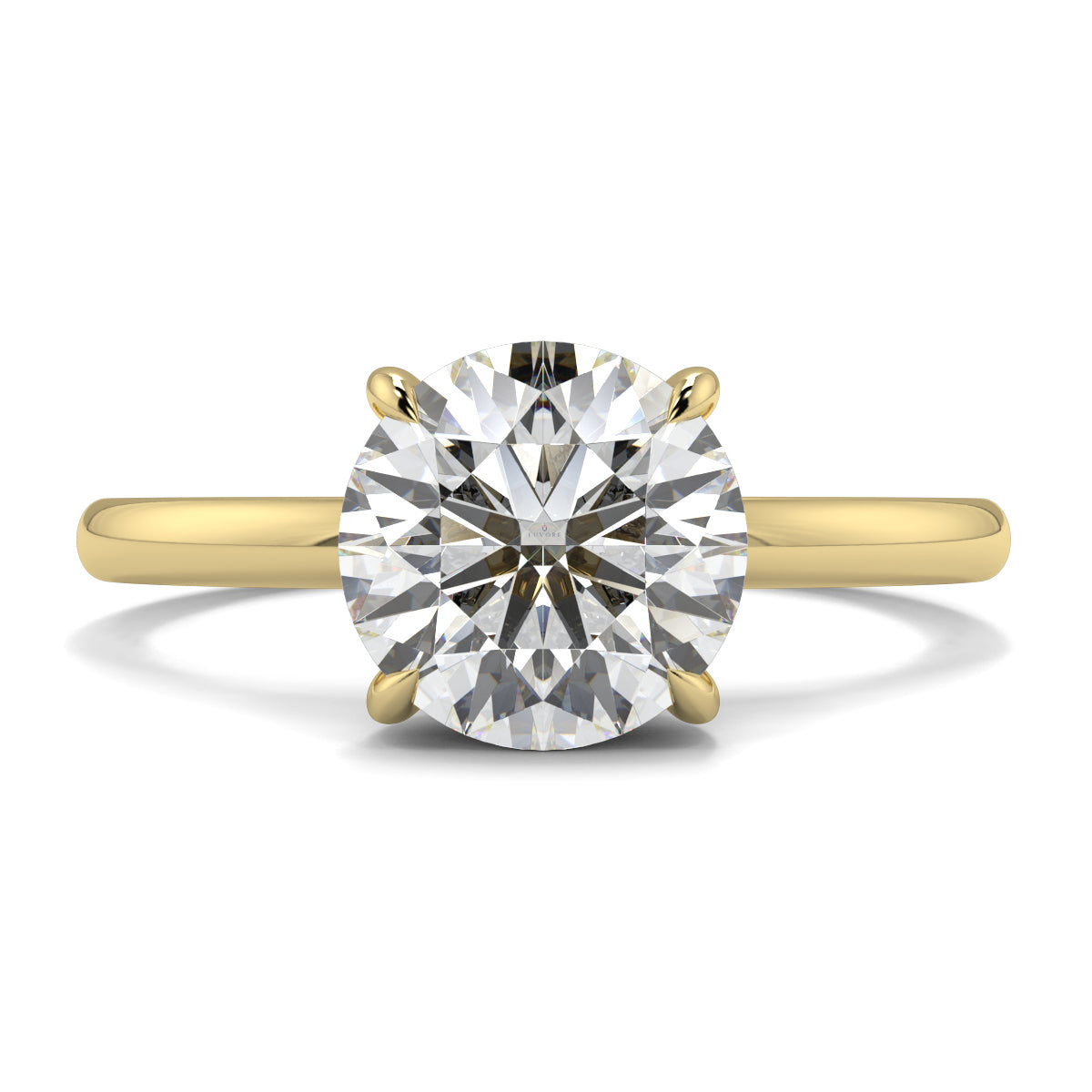 Gold ring with a large diamond on a white background _yb_jewellers_solitaire_engagement_ring_best_selling_design_cushion_shape_diamond_4_claw_with_a_slim_band