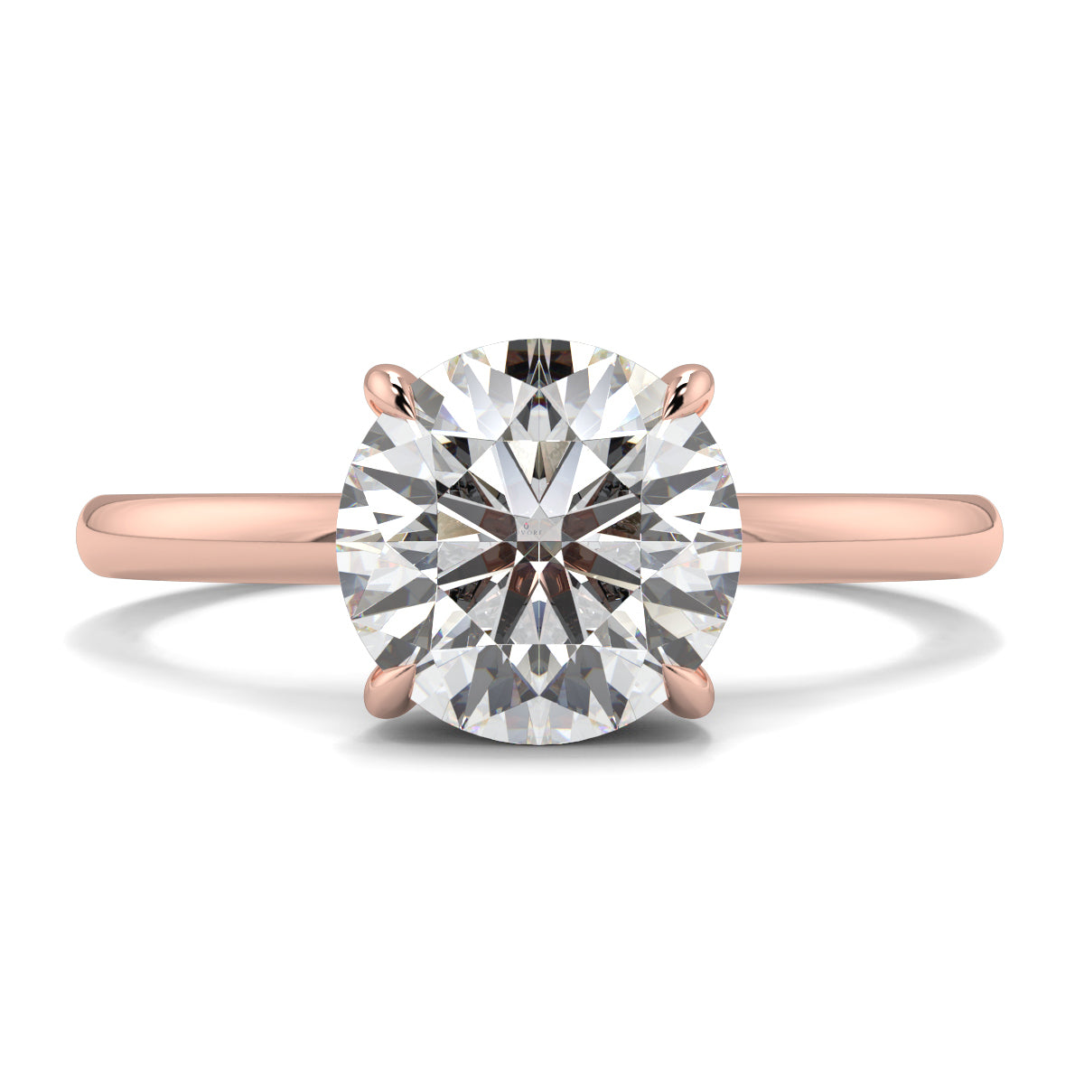 Rose gold ring with a large diamond on a white background _yb_jewellers_solitaire_engagement_ring_best_selling_design_cushion_shape_diamond_4_claw_with_a_slim_band