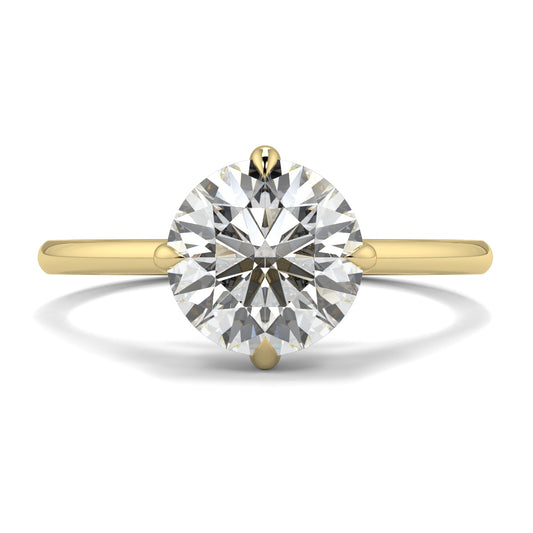 Gold ring with a large diamond on a white background yb jewellers 4 claw compass claw best selling engagement ring thin band 4 claw ring