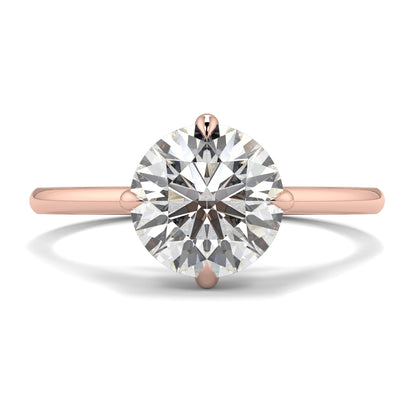 Rose gold ring with a large diamond on a white background yb jewellers 4 claw compass claw best selling engagement ring thin band 4 claw ring