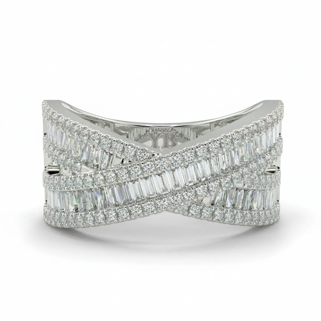 Diamond ring with baguette and round cut diamonds on a white background
