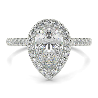 Diamond ring with pear-shaped center stone and halo on a white background yb jewellers Pear engagement ring 