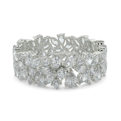 Silver bracelet with clear gemstones on a white background yb jewellers designer bracelet with fancy diamonds and set in platinum 18k white gold 