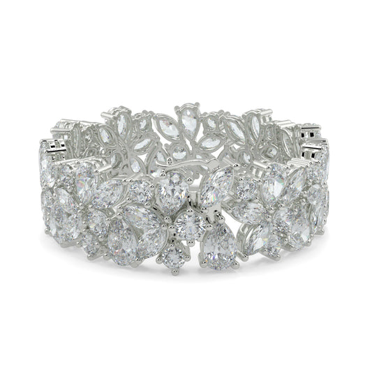 Silver bracelet with clear gemstones on a white background yb jewellers designer bracelet with fancy diamonds and set in platinum 18k white gold 